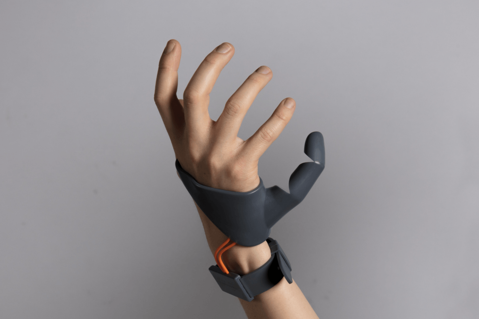 Forget Third Arms, What About a Third Thumb?